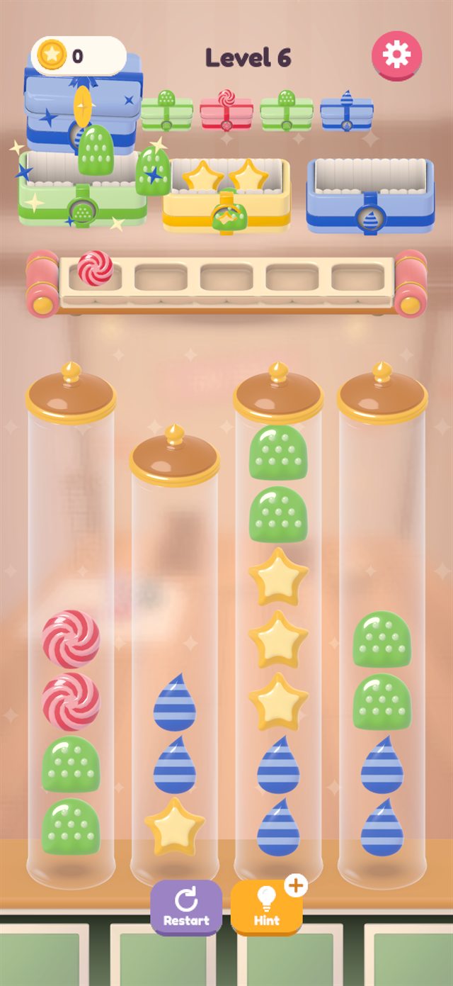 A Candy Box Sort level: jars of candies under a row of gift boxes and a conveyor